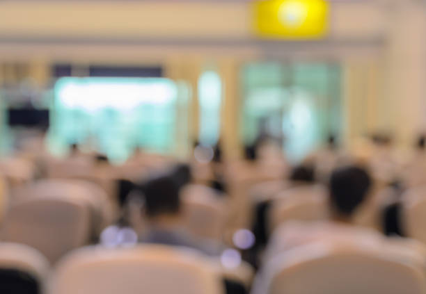 istock Blurred image of passengers in airport terminal background 579124728