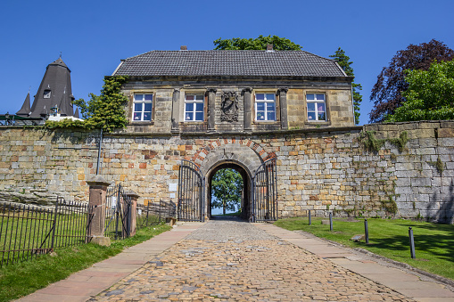 Bad Bentheim, Germany - July 19, 2016: Entrance house of the hilltop castle. Bentheim Castle is an early medieval hill castle in Bad Bentheim, Lower Saxony, Germany. The castle is first mentioned in the 11th century under the name binithem