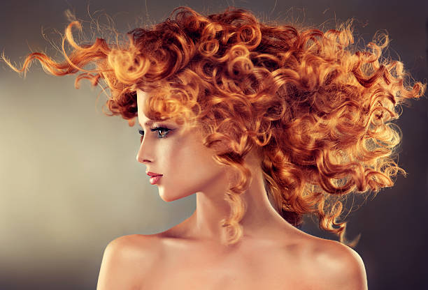 pretty red haired girl with curly hairstyle. - bangs fashion model women elegance imagens e fotografias de stock