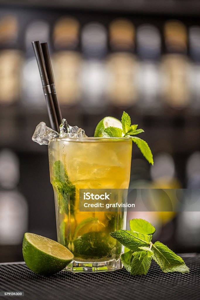 Mint julep cocktail Mint julep cocktail shot on a bar counter in a nightclub Alcohol - Drink Stock Photo