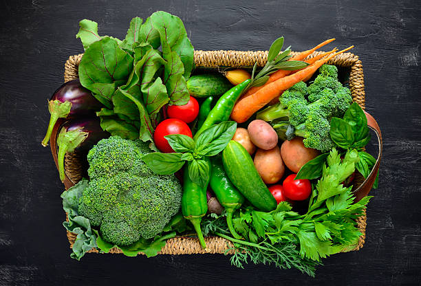 istock Fresh farm vegetables in a basket 579135152