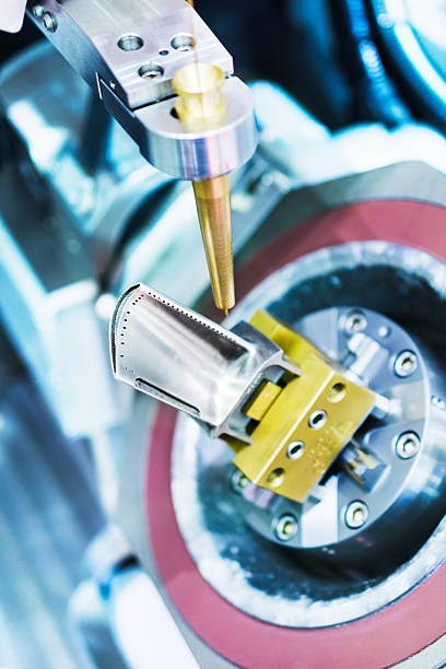 istock EDM machine handles aircraft engine turbine blade. 579135514