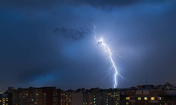 istock Storm clouds, heavy rain. Thunderstorm and lightning over the city. 579135996