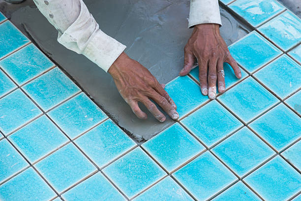 Tile builder swimming pool stock photo
