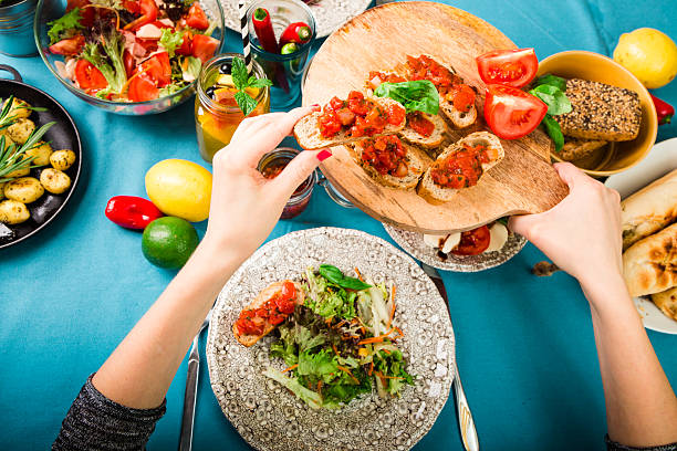 Beautifully laid table with delicious food from an aerial view