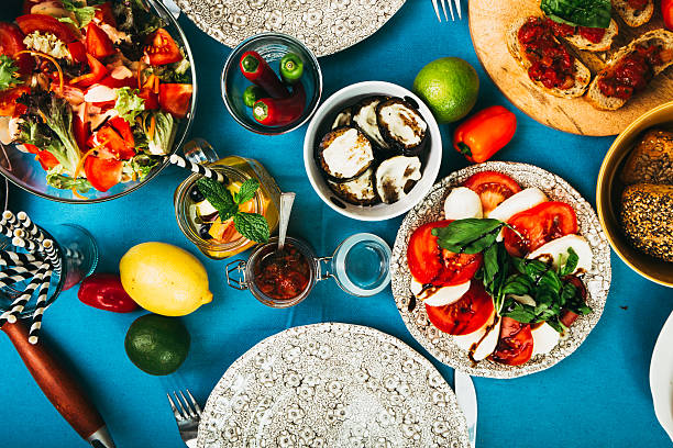 Nicely laid table with delicious food from an aerial view