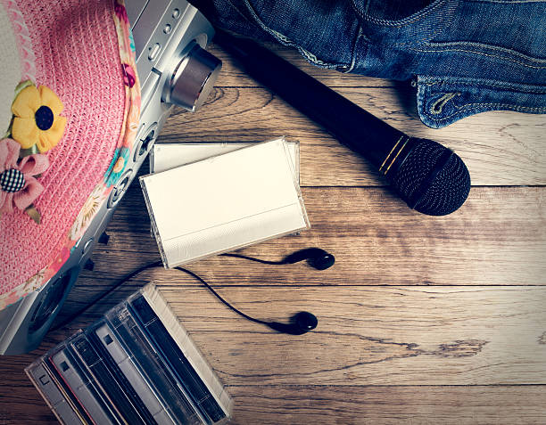 istock Set of audio device on wooden background 579141078
