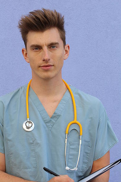 istock Portrait of a smiling handsome doctor 579141804