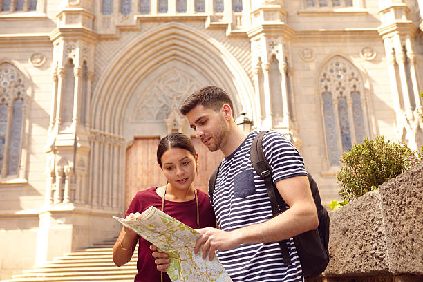 istock Young tourist couple on vacation with a backpack 579148762