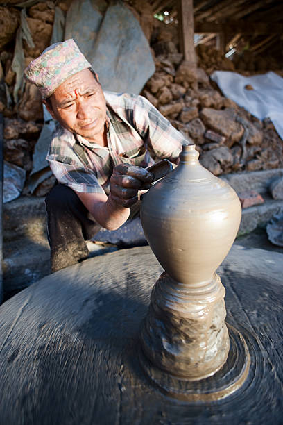 istock Pottery making on potters square, Bhaktapur, Nepal 579148804