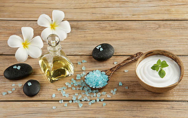 istock spa setting concept with oil bottle, blue salt sea 579150344