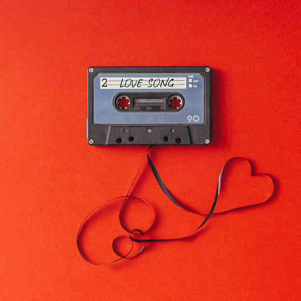 istock Vintage cassette tape on red background. 579152582