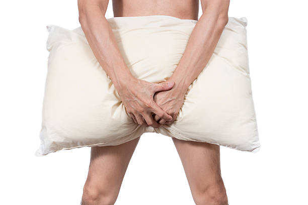 istock unhappy man with sex problem, body pose look like x 579155676