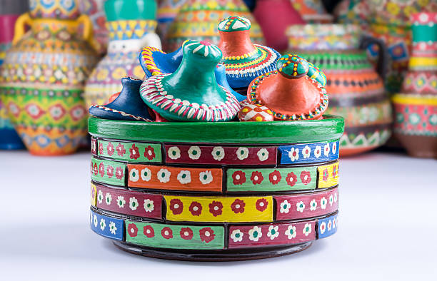 Composition of artistic handcrafted painted pottery containers