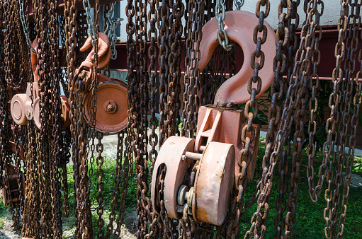 Several old industrial chain and pulley