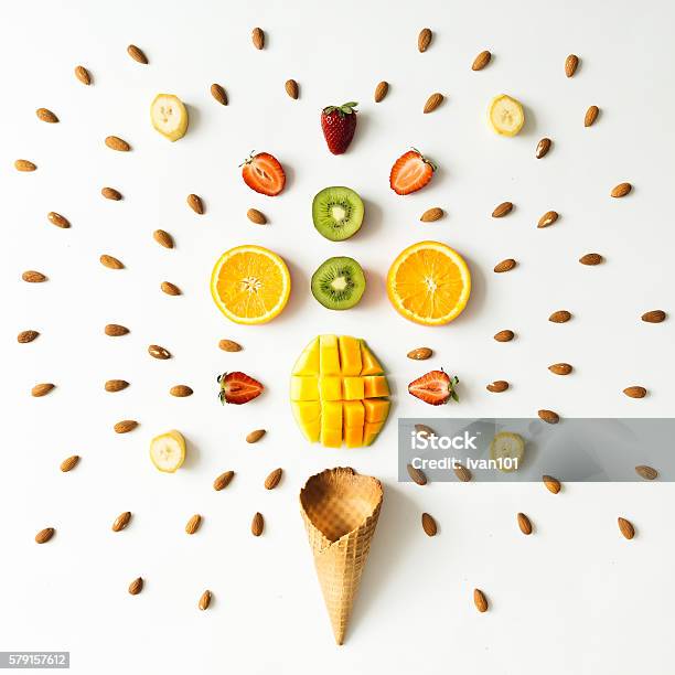 Creative Layout Of Fresh Fruits Nuts And Ice Cream Cone Stock Photo - Download Image Now