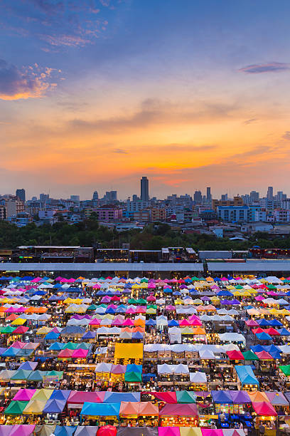 istock Aerial view multiple colour weekend market rooftop 579157688