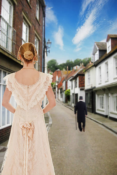 istock victorian woman watching man on street 579159502