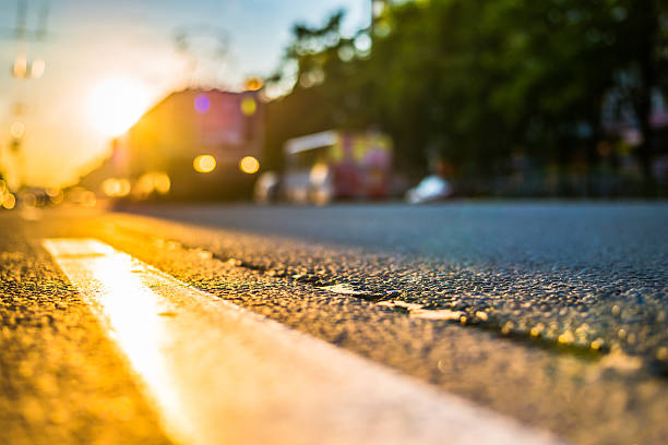 istock Sunny day in a city, view from the road level 579161350