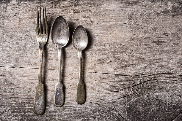 istock old cutlery on wooden table 579162072