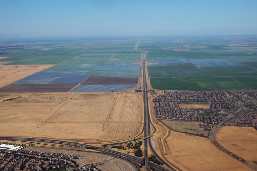 Aerial view of the edge of urban Sacramento and a farmland in California.