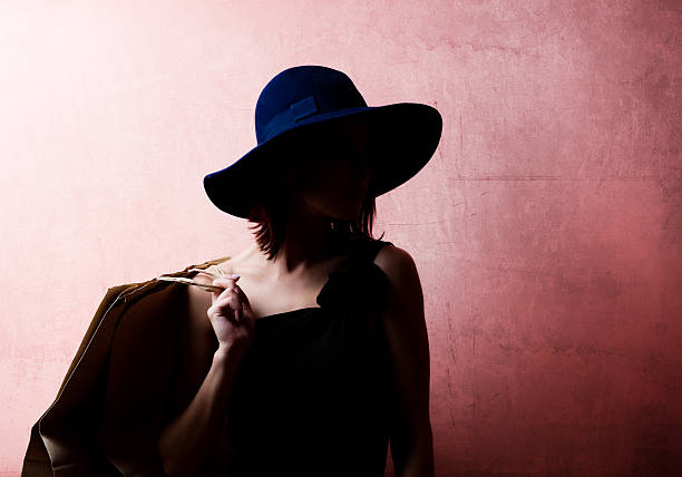 istock young woman with shopping bags 579219330