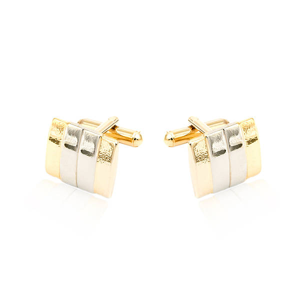 istock Golden cuff links on white 579220336