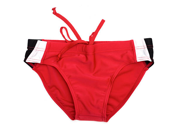 赤い水泳トランクは白い背景に隔離 - swimming trunks bikini swimwear red ストックフォトと画像