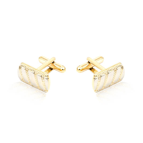 istock Golden cuff links on white 579220506