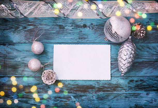 istock Christmas background with silver balls, cones, ribbon 579221434