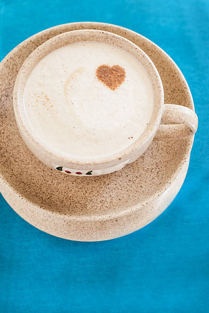 istock Cup and saucer and heart on a blue background 579221770