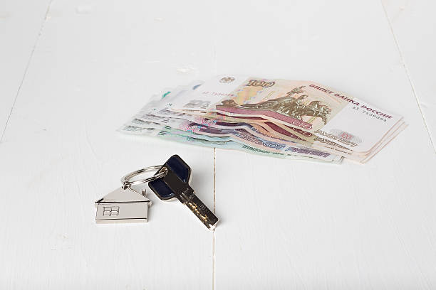 istock Russian paper money house keys 579223160