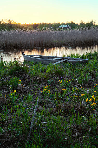 istock Sunset on the river. Boat station 579228868
