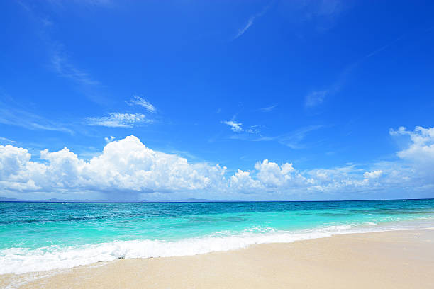 Summertime at the beach Beautiful beach in Okinawa　Japan waters edge stock pictures, royalty-free photos & images
