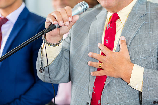 istock Politician speaking into midrophone 579232618
