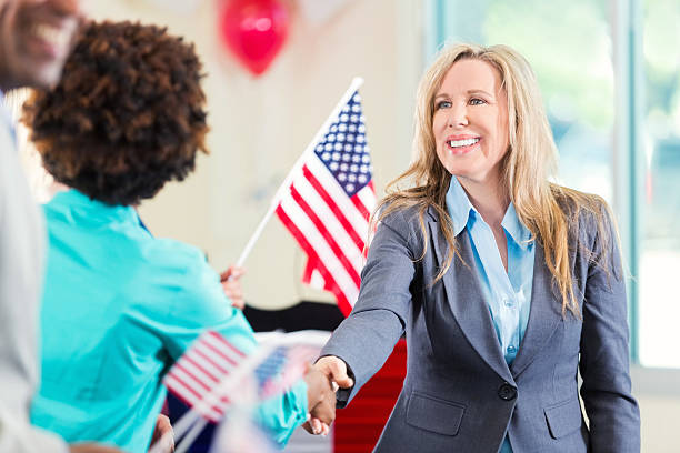 istock Beautiful Blond Politician shaking hands 579232634