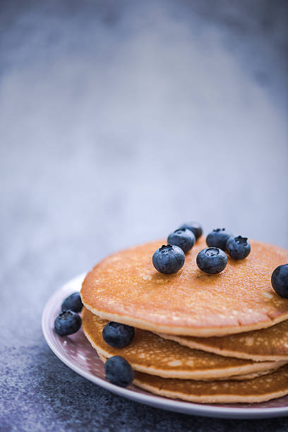istock pancakes with blueberries and honey 579234970