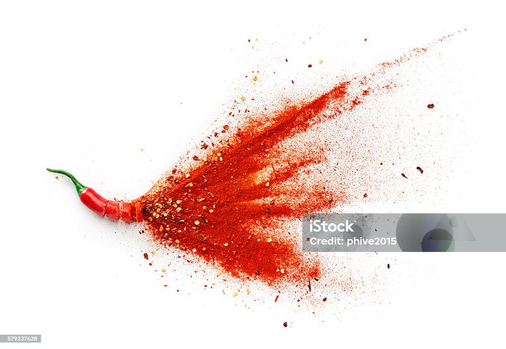 Chilli, Red Pepper Flakes and Chilli Powder Chilli, red pepper flakes and chilli powder burst Spice Stock Photo