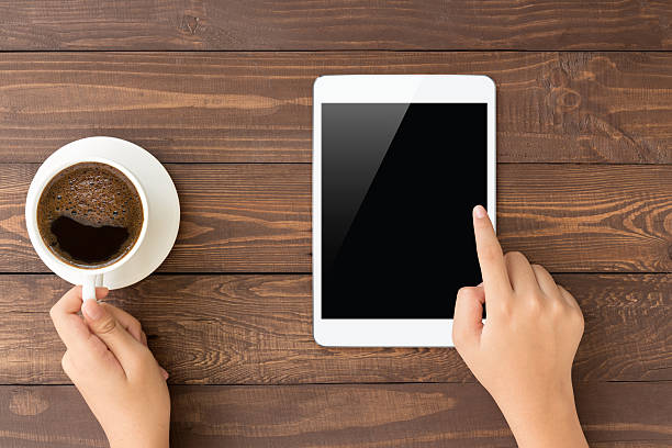 istock female touch on white tablet blank screen on top view 579238914