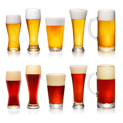 Set of different cups and glasses of beer isolated on white background