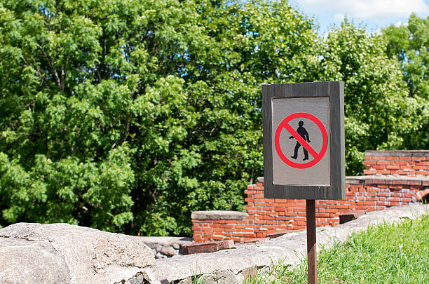 istock Unrecognizable persons violating the prohibition to walk. 579241642