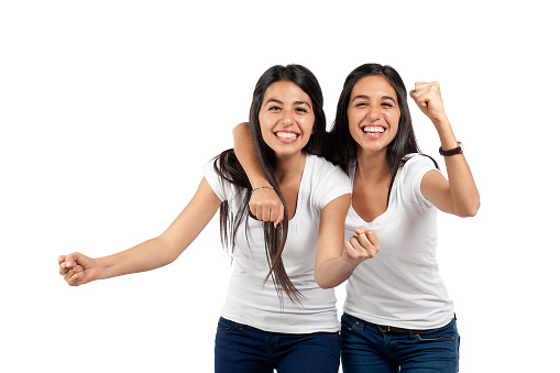 Two young cheering girls