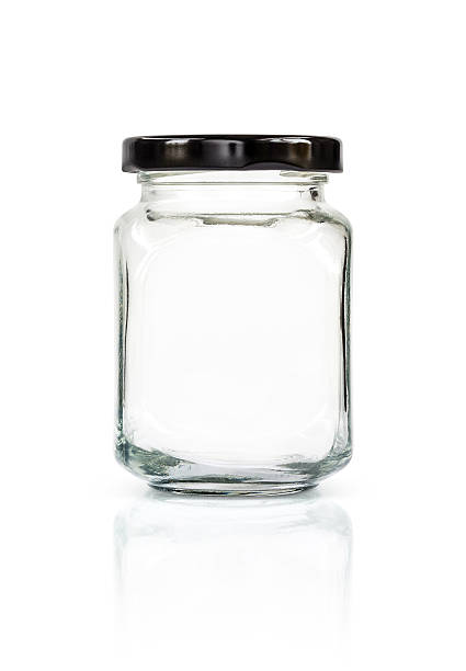 istock Clear glass bottle with black cap isolated on white 579243078