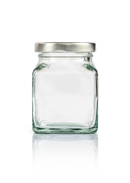 istock Clear glass bottle with silver cap isolated on white 579243206