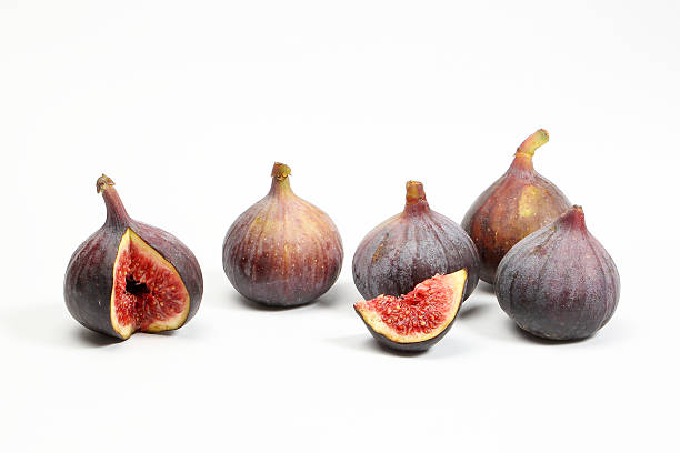 Flor De Fruta De Higo Foto de stock y más banco de imágenes de Alimento - Alimento, Comida gourmet, Fondos - iStock Flor De Fruta De Higo Foto de stock y más banco de imágenes de Alimento - Alimento, Comida gourmet, Fondos - iStock