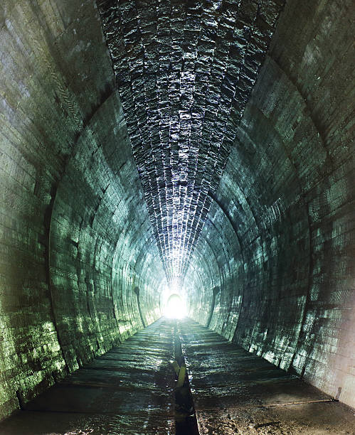istock Inside of a grungy tunnel 579246396