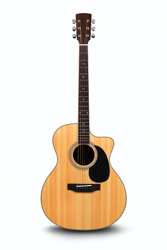 Acoustic guitar is isolated on the white background.