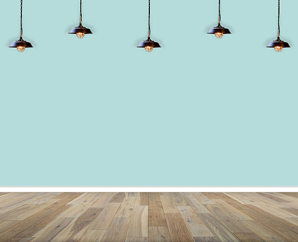 istock interior empty room. wall and wooden floor with lamp 579247160