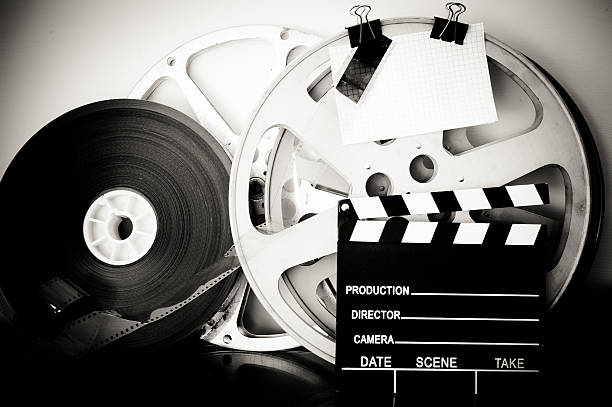 istock Vintage analog movie reel and clapper 579248980
