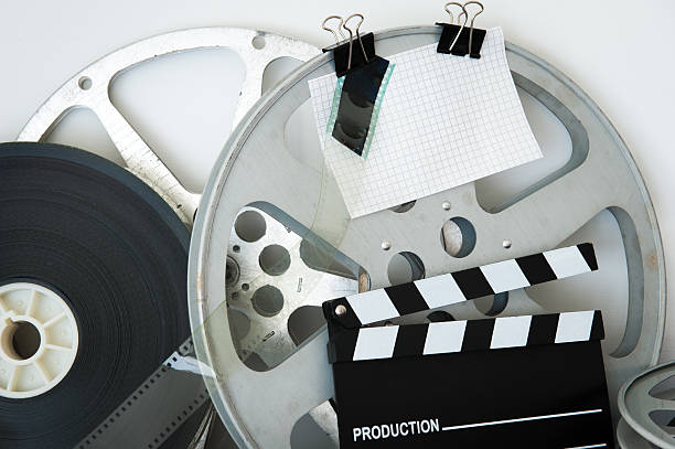 istock Vintage analog movie reel and clapper 579249012
